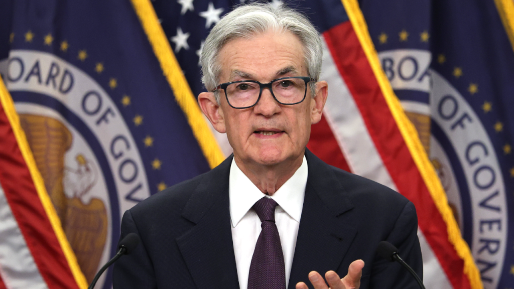 Fed Holds Interest Rates Steady, Resisting Pressure From Trump